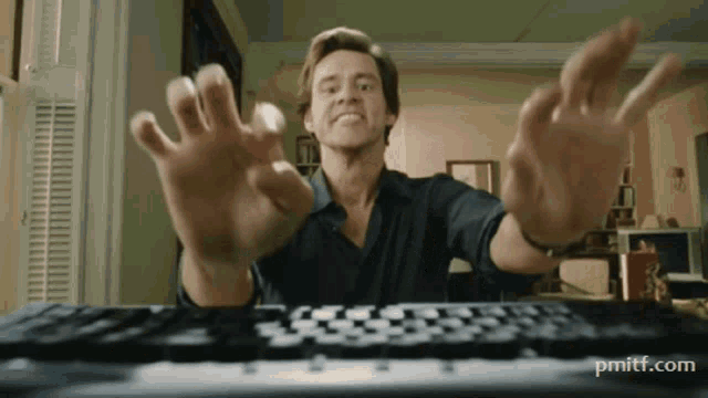 Jim Carrey typing aggressively